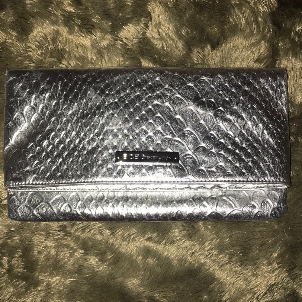 BCBG fold Clutch